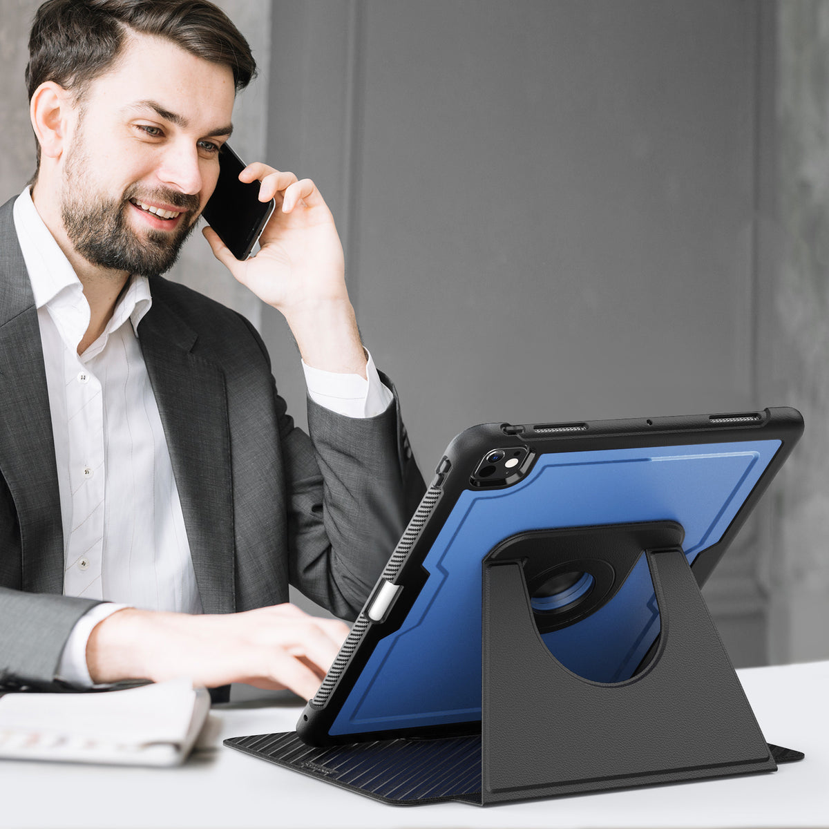 Professional man using SEYMAC iPad Pro 13 Inch Case (M5/M4) in office with detachable stand and multi-angle support.